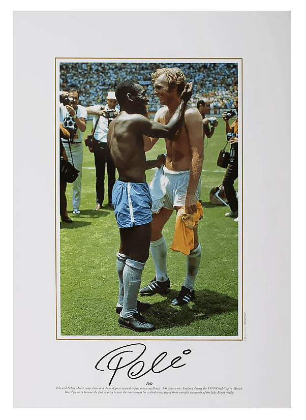 Pele Autographed Brazil Photo: Swapping Shirts With Bobby Moore
